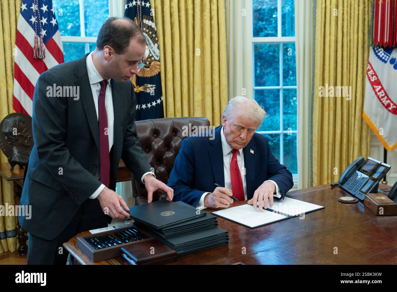 United States President Donald J Trump signs executive orders in the
