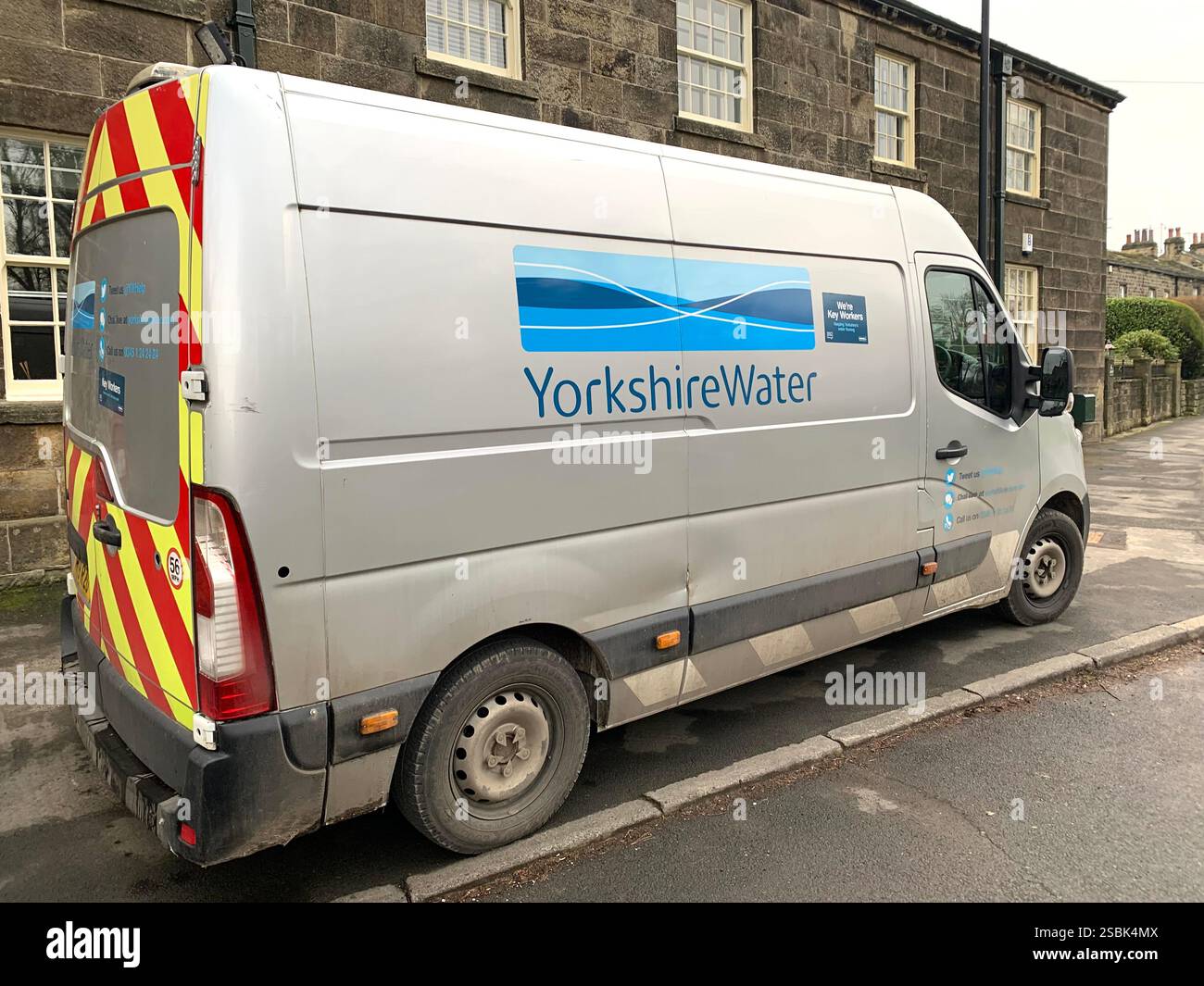 Yorkshire water board van silver working workers parked parking outside a house west street road repairs flood burst pipe working out silver Ford UK - Smartphone Captured Stock Image