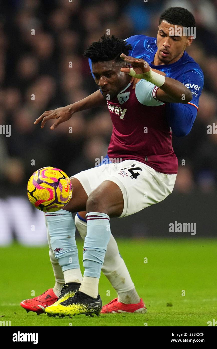 Chelsea's Levi Colwill, background, and West Ham's Mohammed Kudus ...