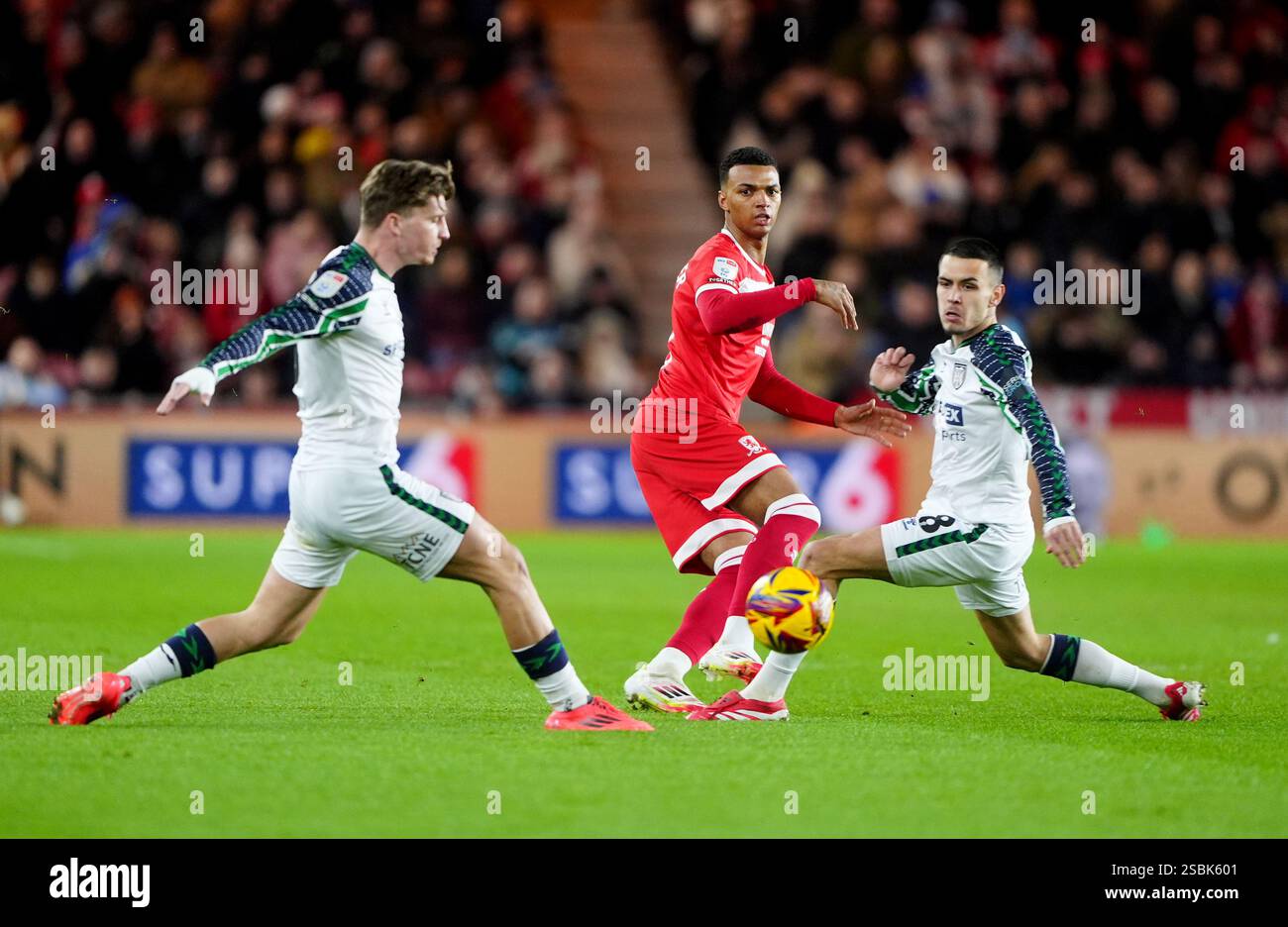 Middlesbrough's Whittaker (centre) and Sunderland's Enzo Le Fee