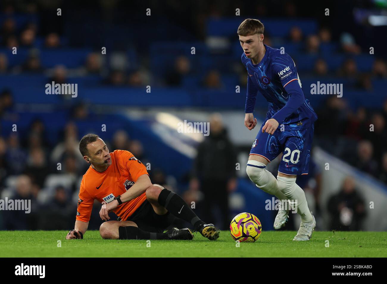 London, England, 3rd February 2025. Referee Stuart Attwell falls to the