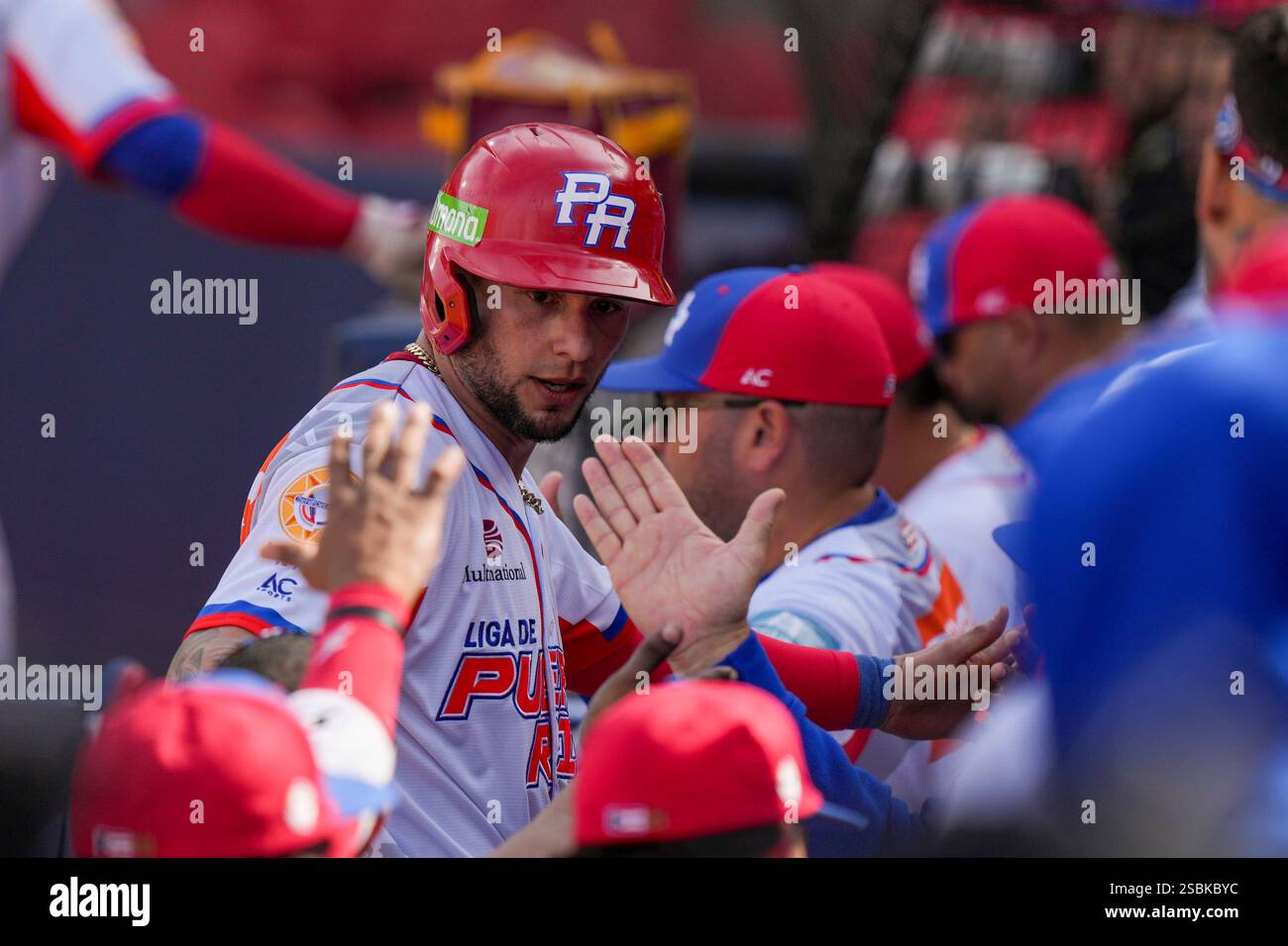 Puerto Rico's Danny Ortiz celebrates after scoring a run against