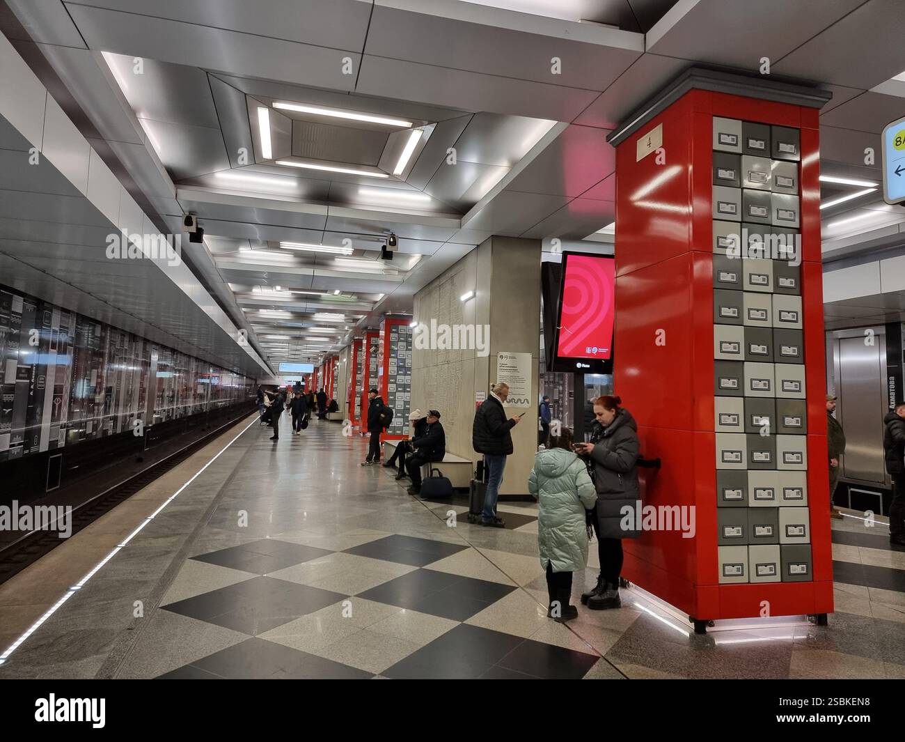 Platform of subway station Rasskazovka Рассказовка on the Kalininsko-Solntsevskaya line of the Moscow metro, with literature theme; books from QR-code - Smartphone Captured Stock Image
