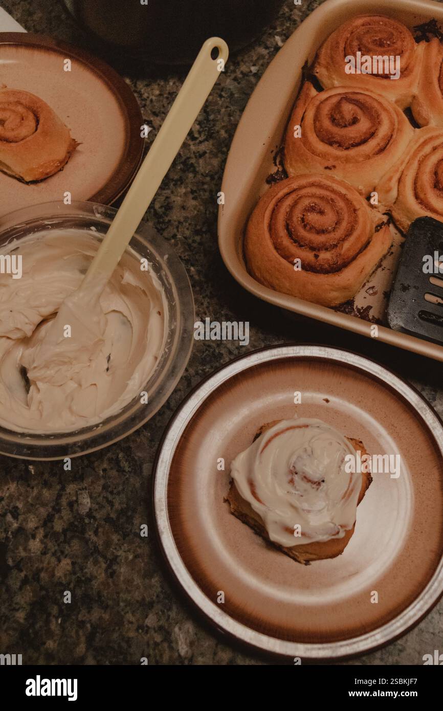 Freshly Baked Cinnamon Rolls with Icing Stock Photo