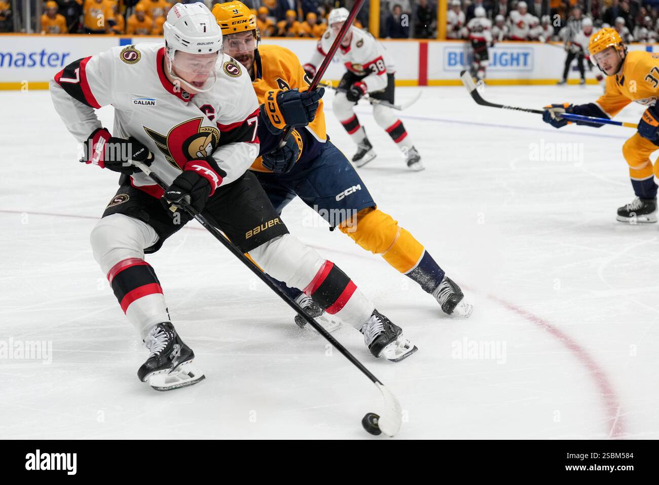 Ottawa Senators left wing Brady Tkachuk (7) skates the puck past ...
