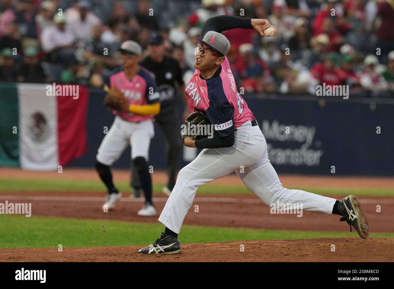 Japan's Rintaro Hirama pitches against Mexico during a Caribbean Series