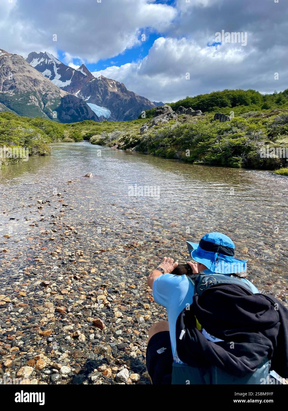 man taking photo of the view - Smartphone Captured Stock Image