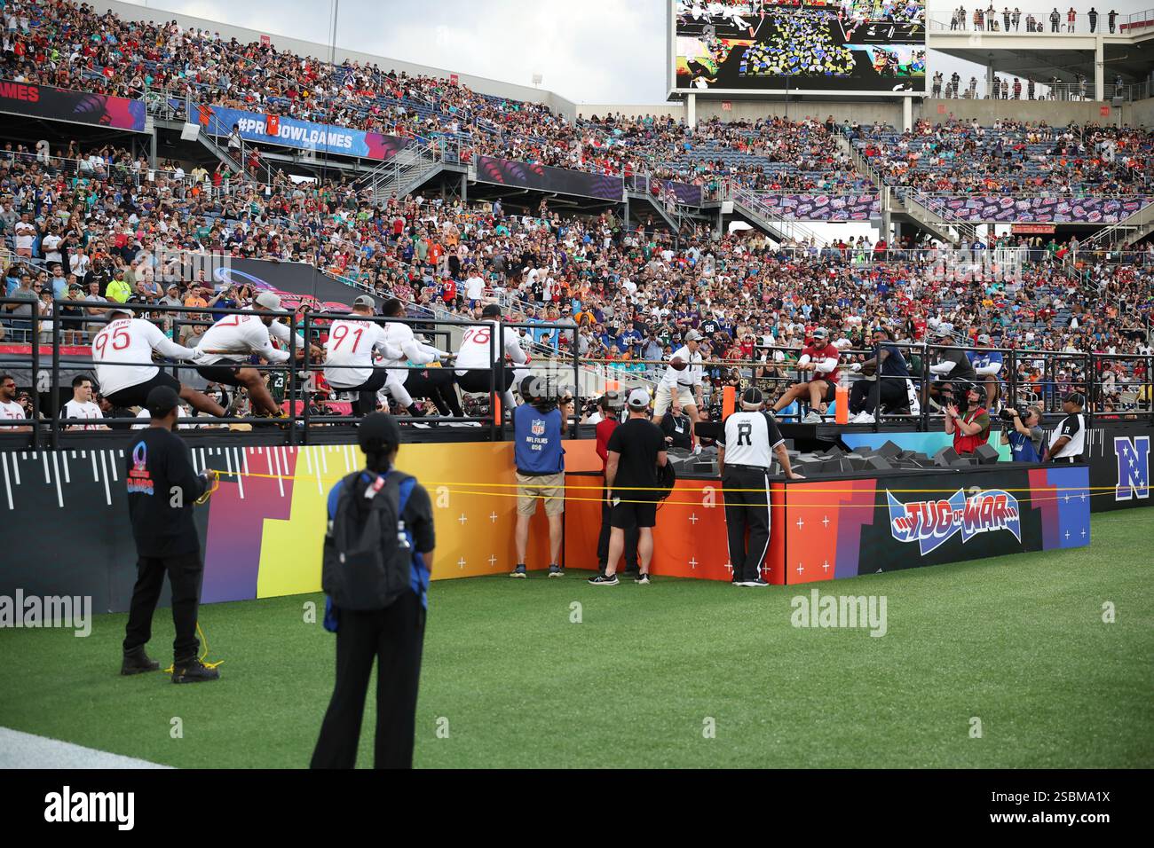 The AFC and NFC battle at tug of war during the NFL Pro Bowl Game on