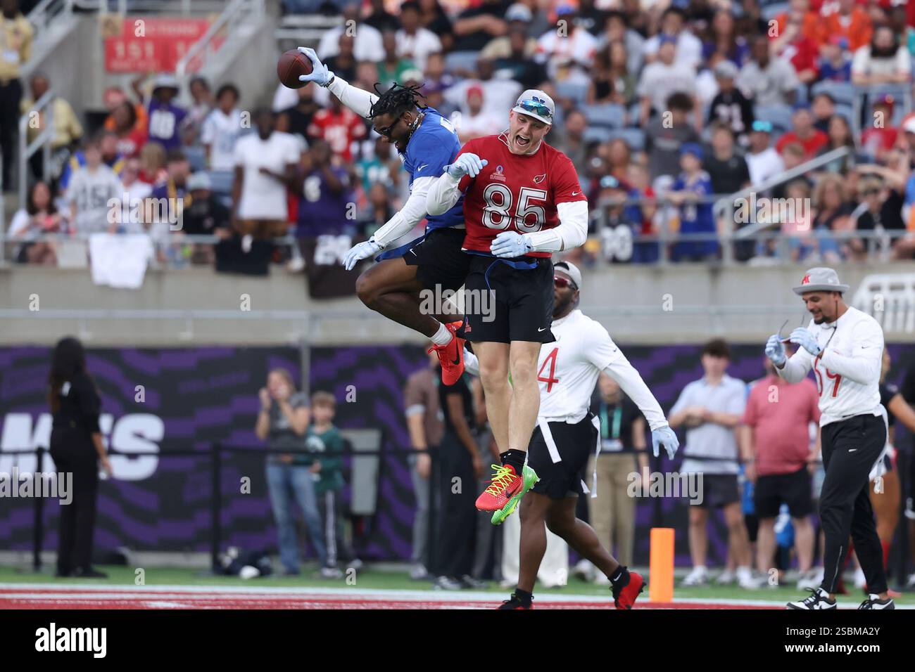 Malik Nabers and Trey McBride celebrate a score during the NFL Pro Bowl