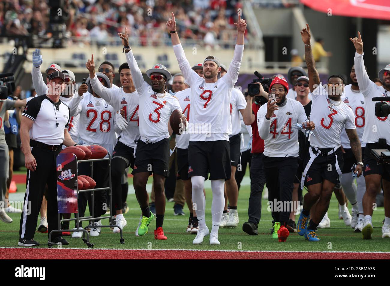 AFC players celebrate after winning th punting competition during the
