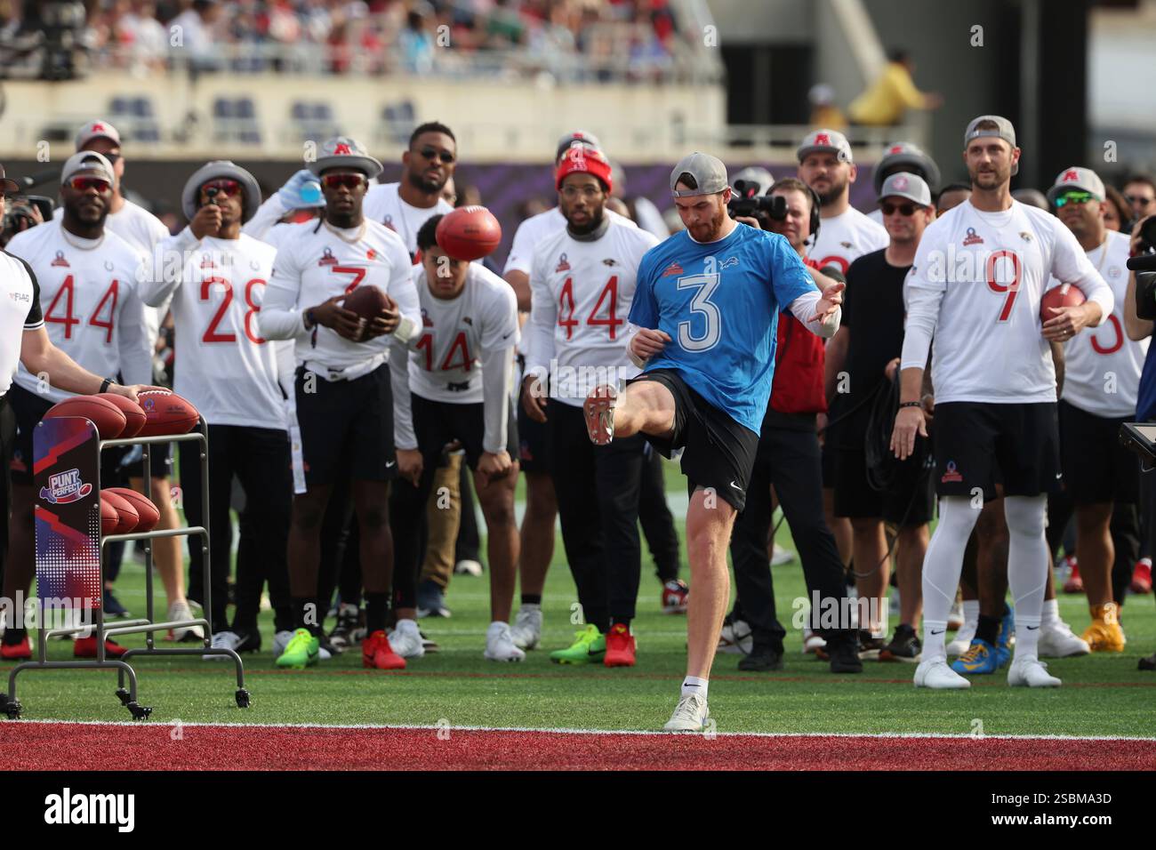 Detroit Lions Jack Fox punts the ball at the Punt Perfect challenge