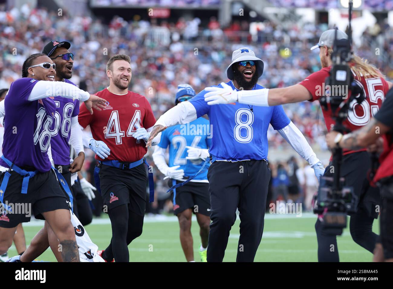 NFC players celebrate a touchdown during the NFL Pro Bowl Game on