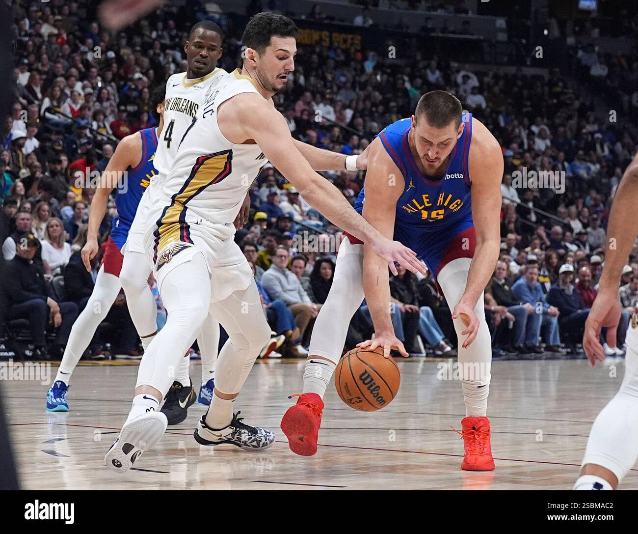 Matkovic Nba New Orleans Pelicans center Karlo Matkovic, front left, covers Denver ...