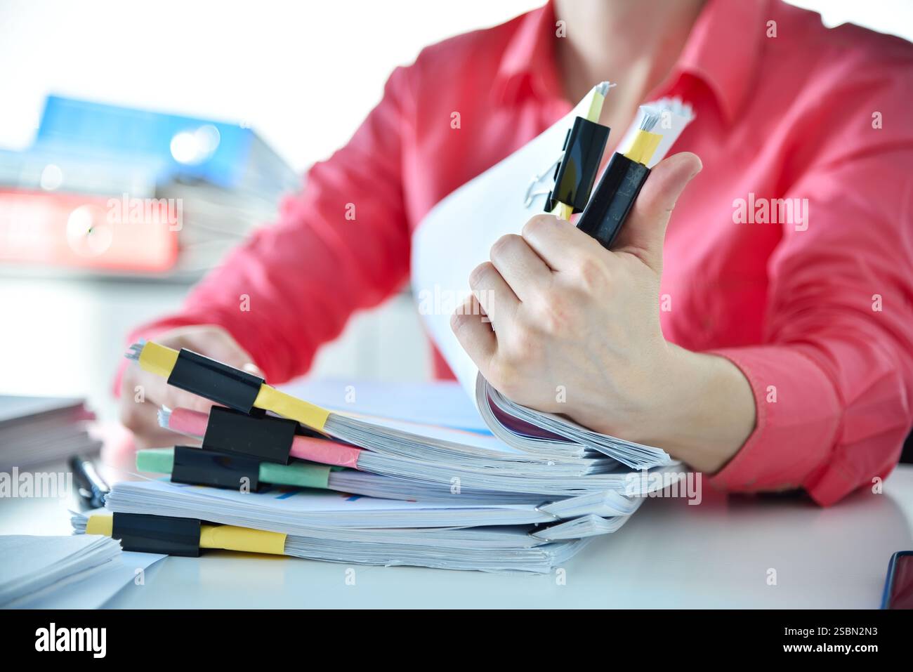 Businesswoman hands sorting business reports and stock charts. Financial and paperwork concept Stock Photo