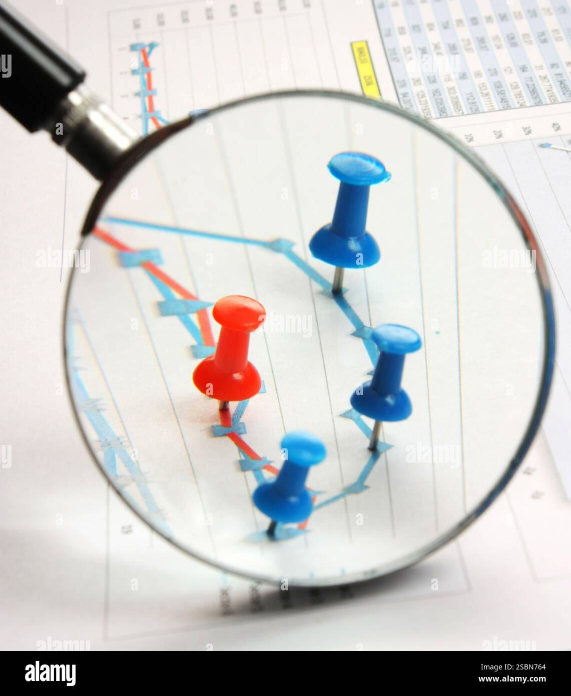 Graphs tables and documents laid on the table Stock Photo
