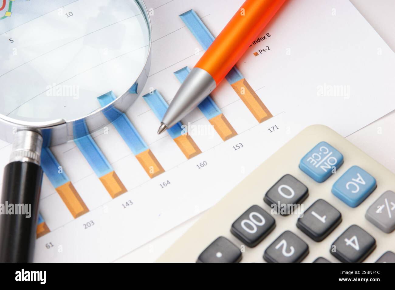 Graphs tables and documents laid on the table Stock Photo