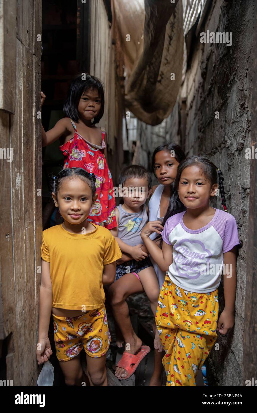 Philippines Manila Malabon Young Girls In An Alleyway In A Slum philippines-manila-malabon-young-girls-in-an-alleyway-in-a-slum