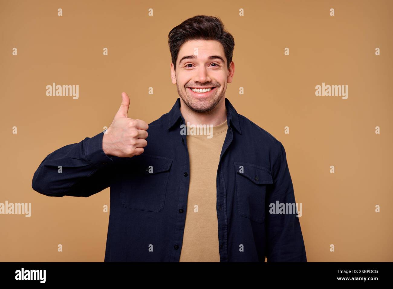 Cheerful young man radiates joy hi-res stock photography and images - Alamy