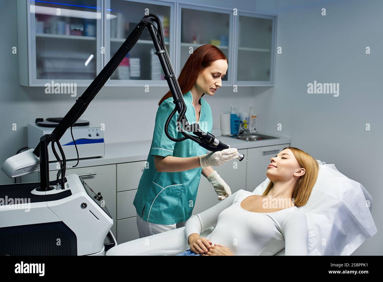 A dermatologist treats a young patient in a modern clinic Stock Photo ...