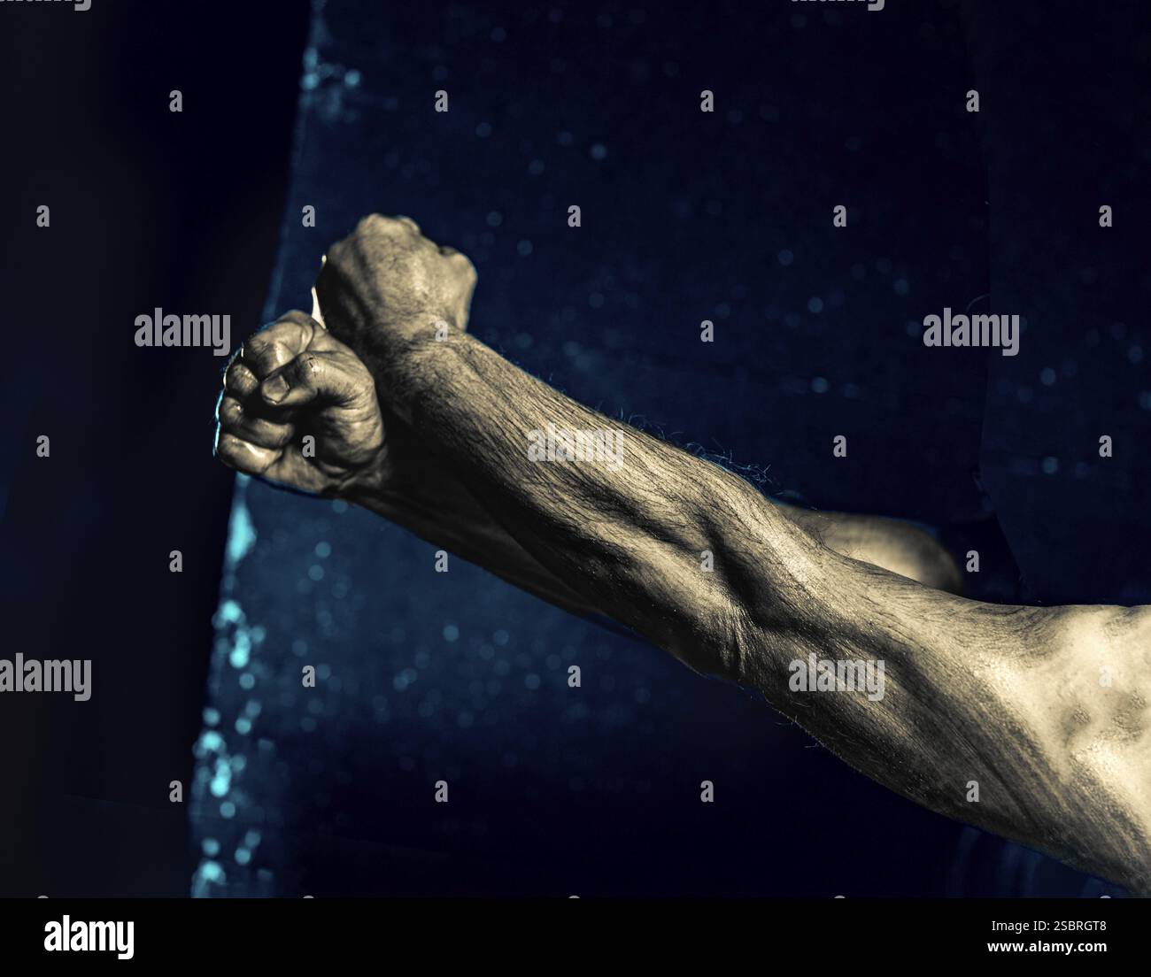 Strong power muscle arms hi-res stock photography and images - Alamy