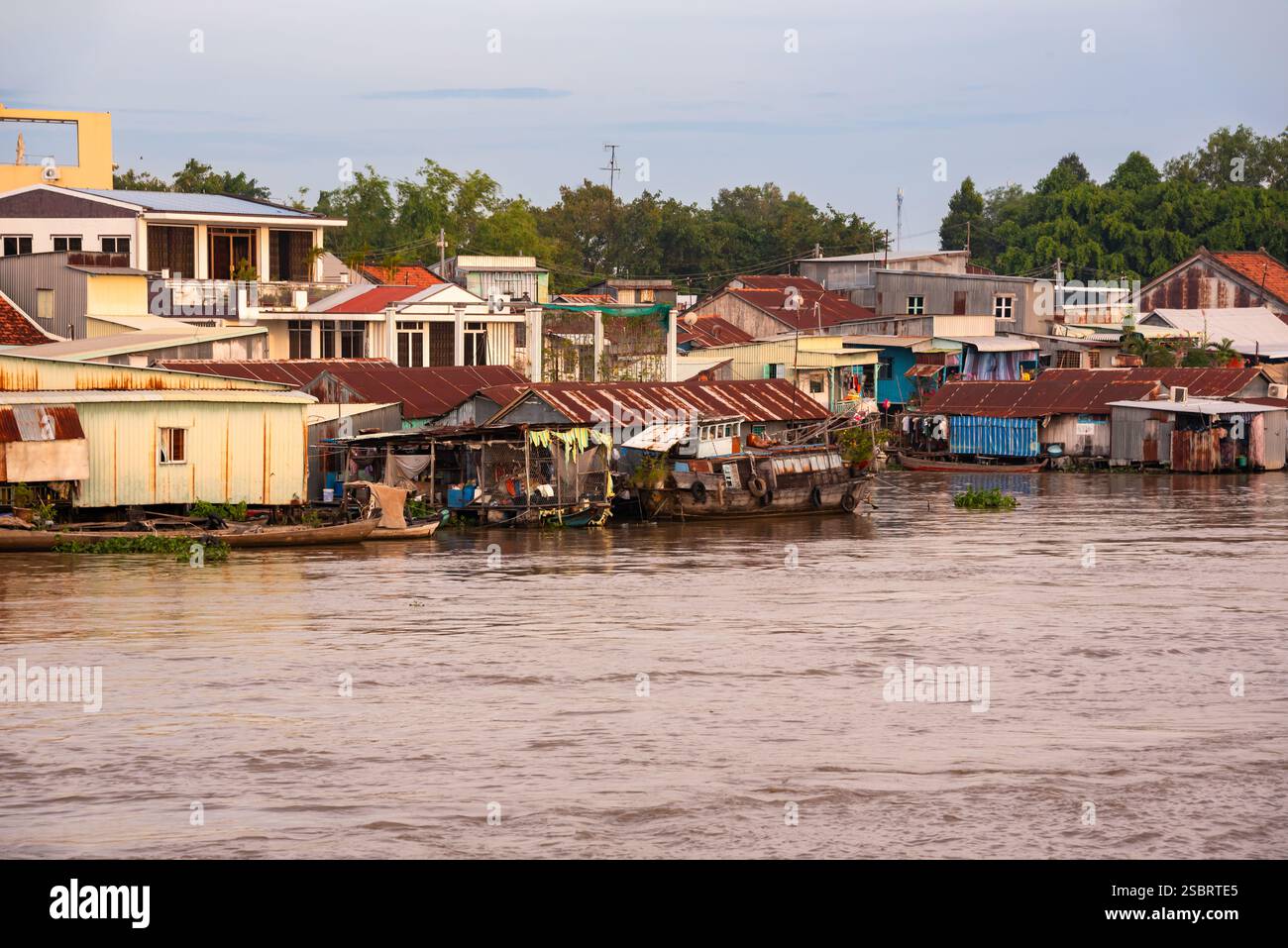 Traditional Mekong river side village in Vietnam Stock Photo - Alamy