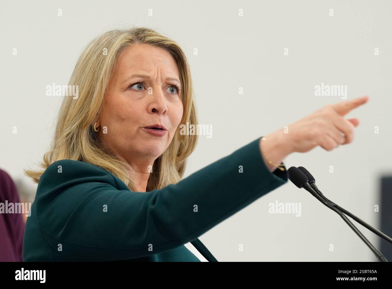 Ontario NDP leader Marit Stiles gestures as she responds to questions