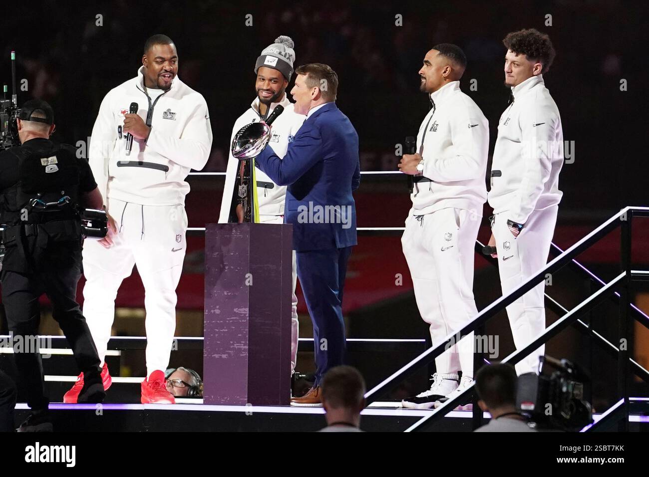 NFL Network host Scott Hanson with Jalen Hurts and Patrick Mahomes at