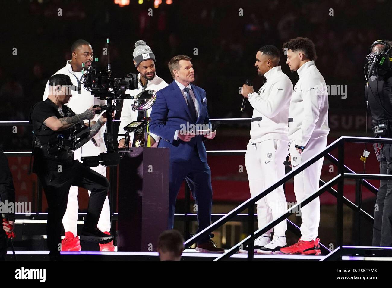 NFL Network host Scott Hanson with Jalen Hurts and Patrick Mahomes at