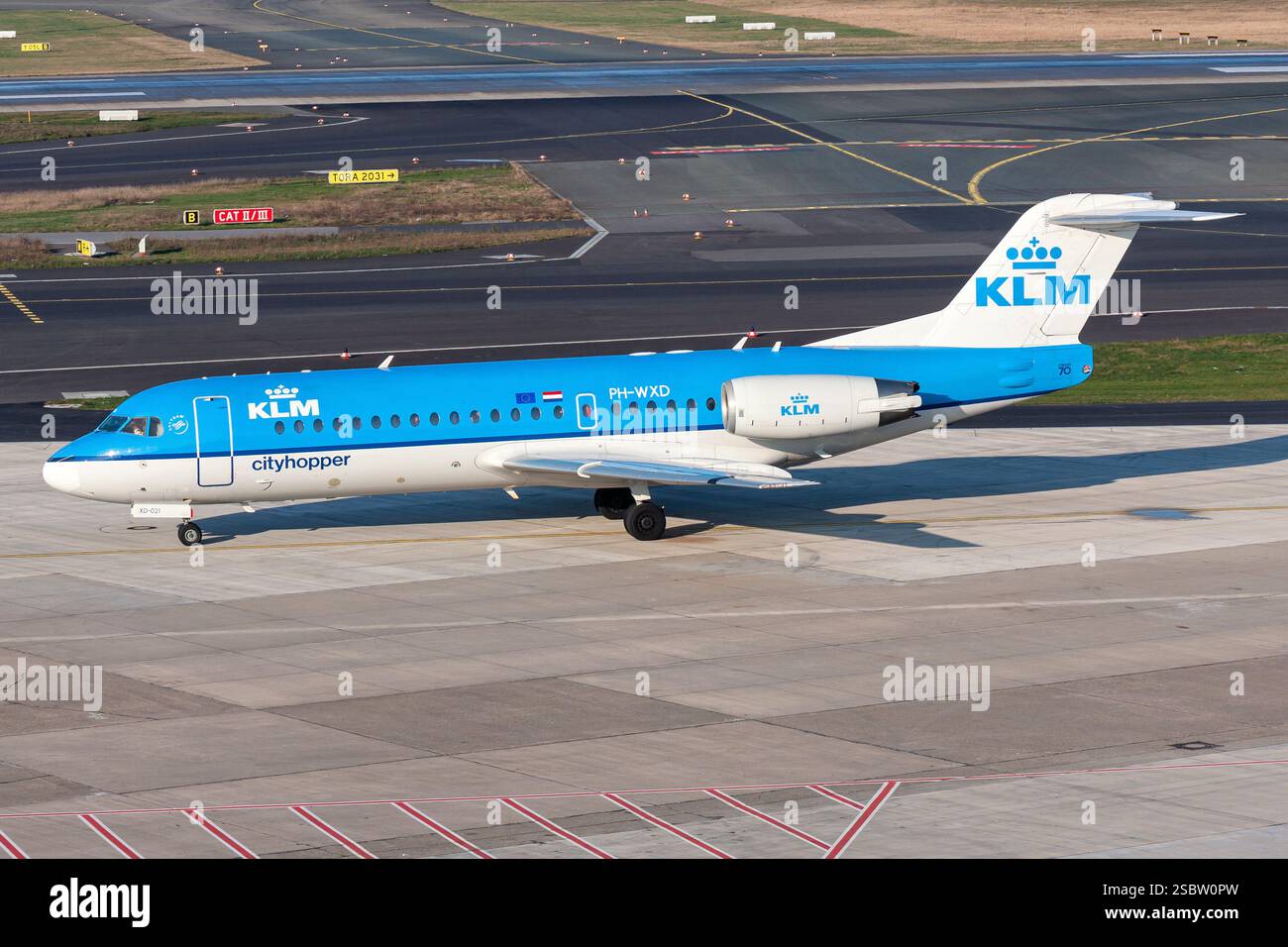 Dutch KLM cityhopper Fokker 70 with registration PH-WXD at Dusseldorf Airport Stock Photo