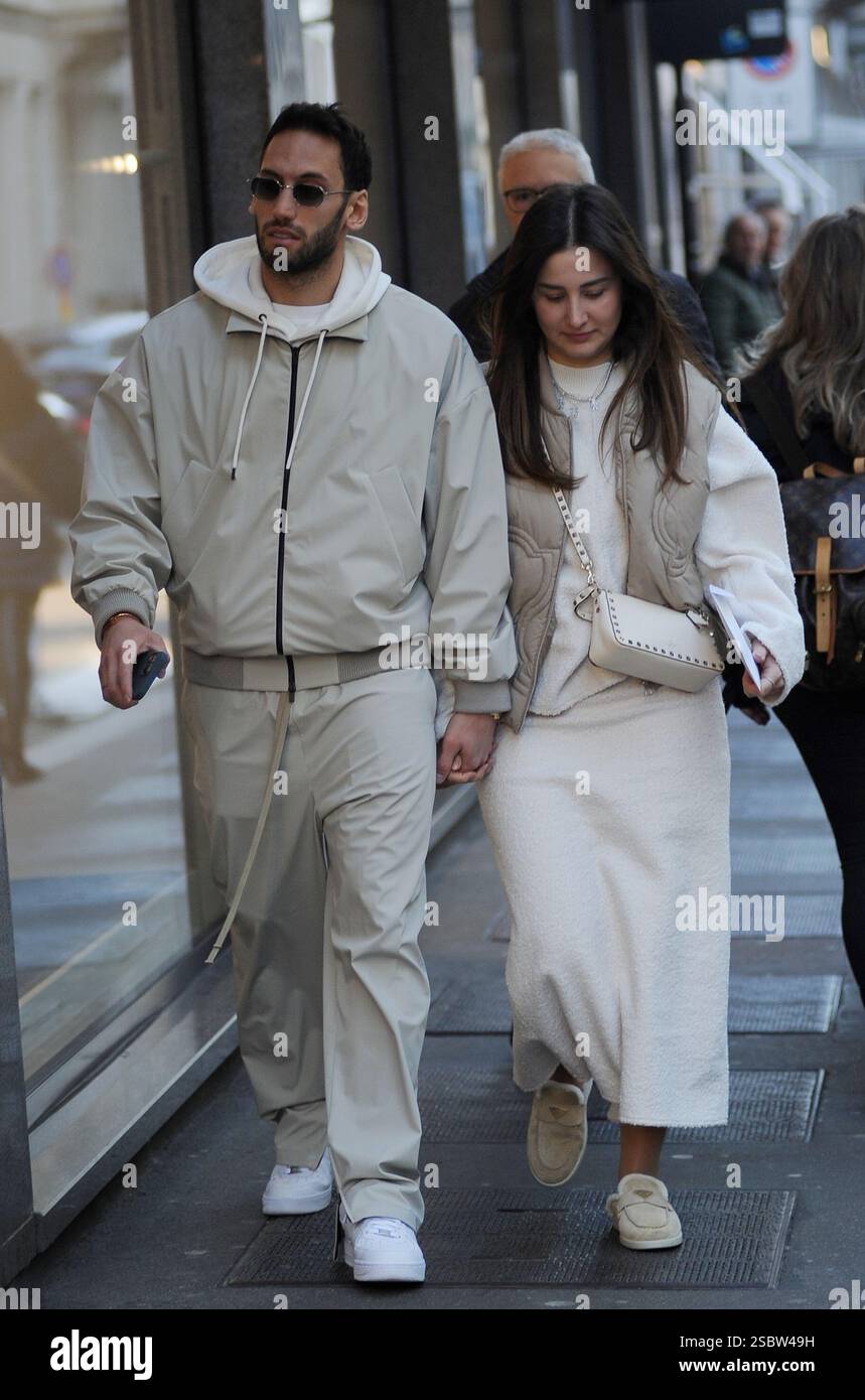 Milan, . 04th Feb, 2025. Milan, Hakan Calhanoglu, midfielder for Inter and the Turkish national team, strolls through the streets of the center with his wife Sinem, then the two enter a boutique to do some shopping. Credit: Independent Photo Agency/Alamy Live News Stock Photo