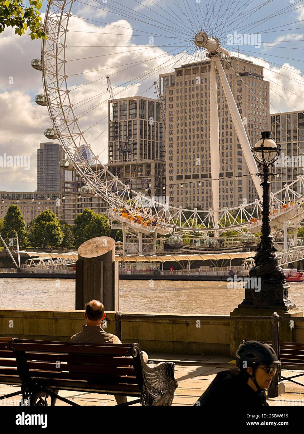 Relaxing by the Thames with a View of the London Eye - Smartphone Captured Stock Image