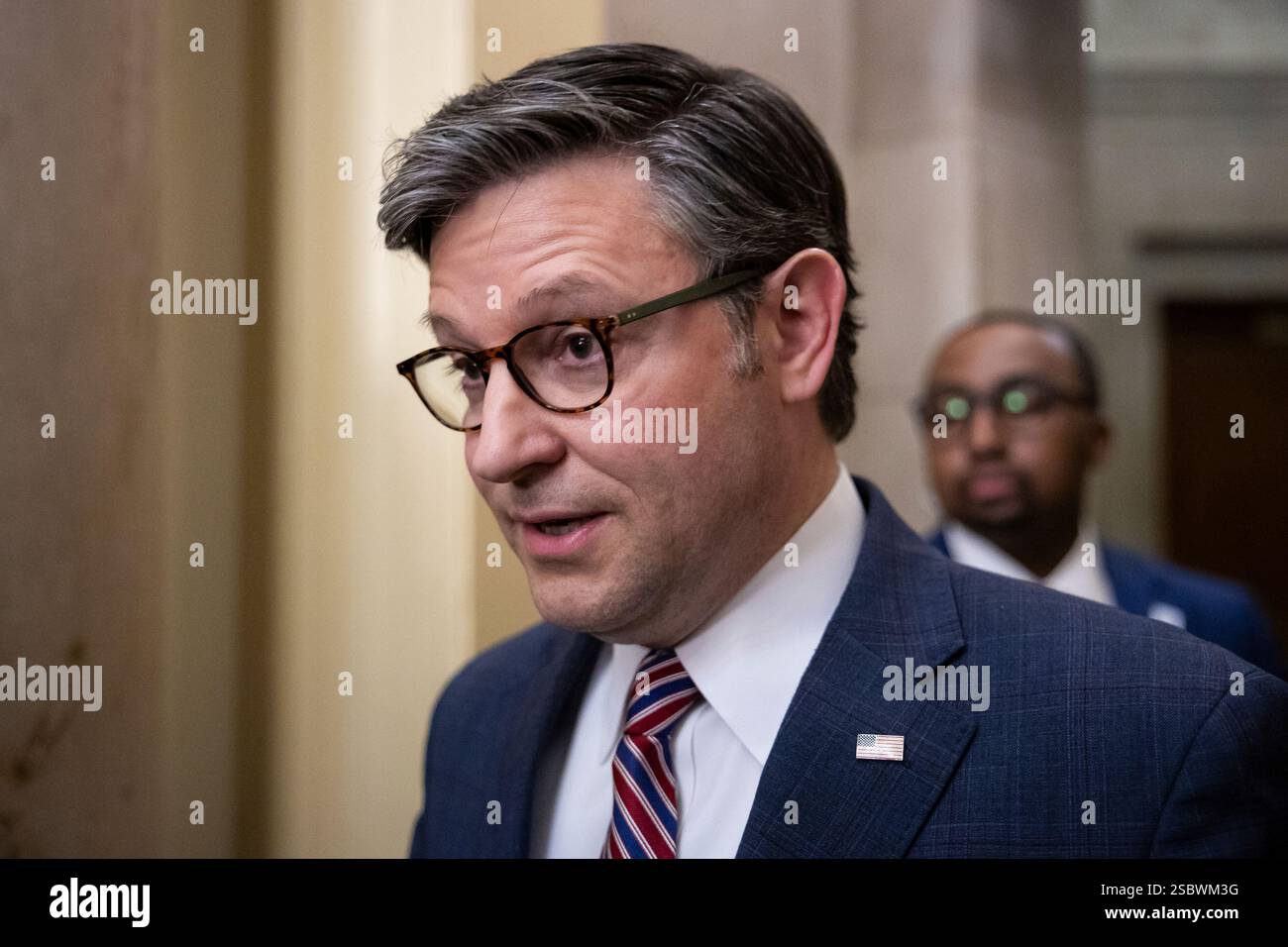 House Speaker Mike Johnson (R-La.) stops to speak with reporters as he ...