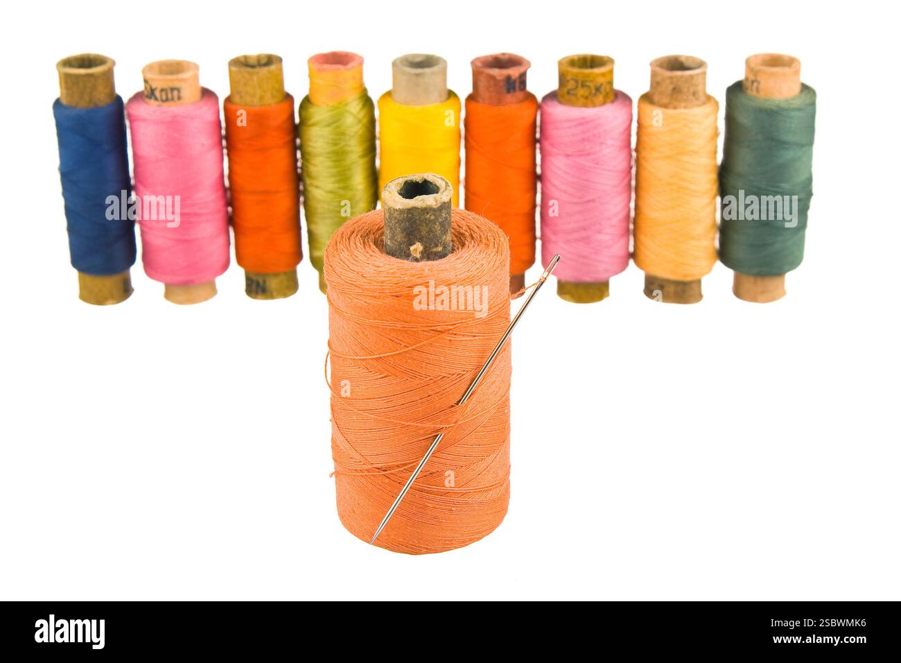 Sewing thread isolated on white background Stock Photo - Alamy