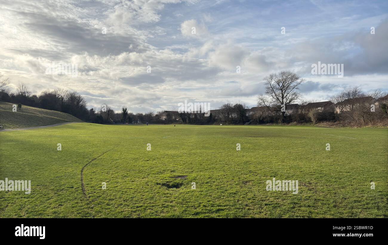 Redhall Park in Edinburgh, Scotland. Open space grass and play park with fields. Public park. - Smartphone Captured Stock Image