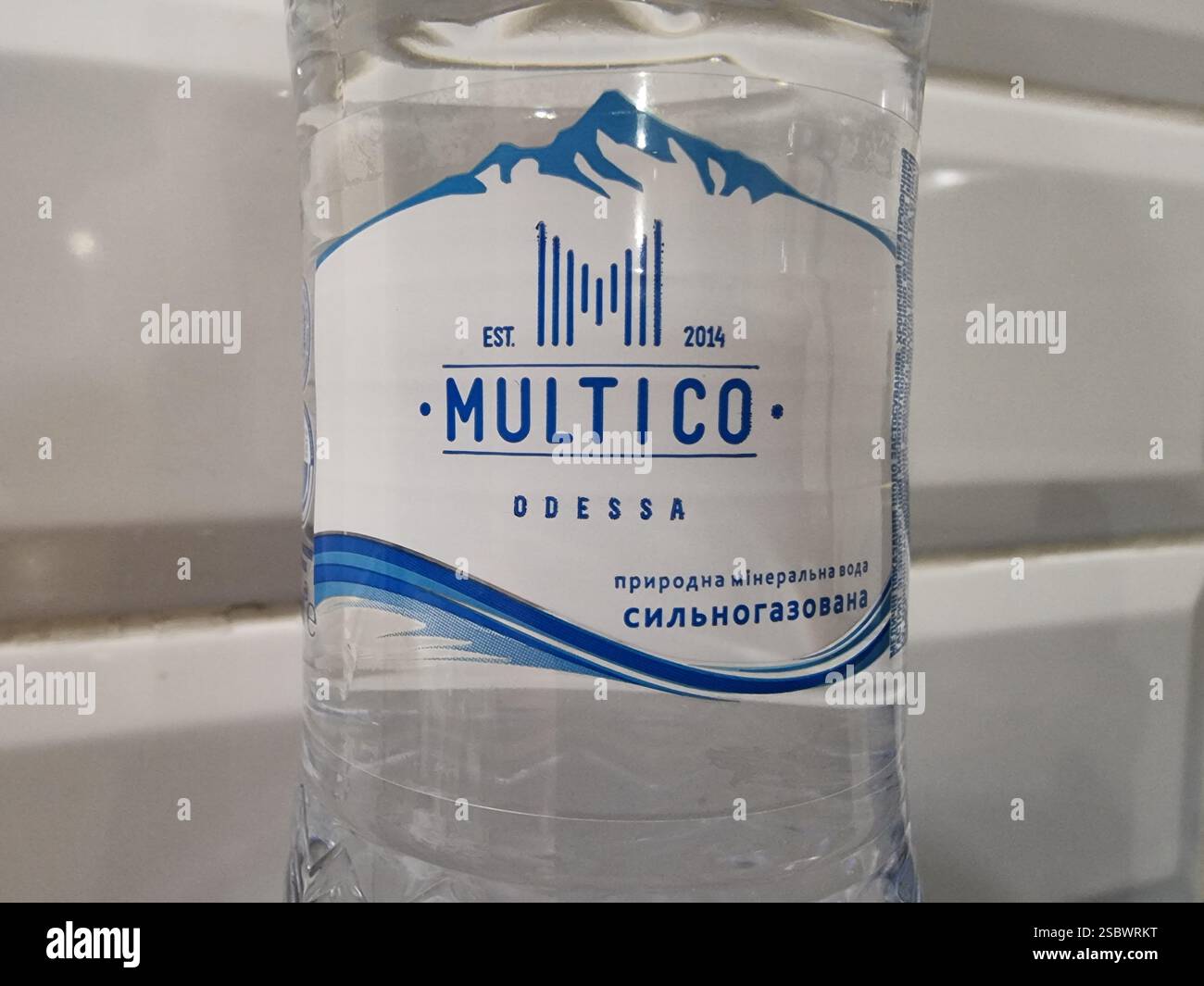 Label on bottle of Multico sparkling mineral water from Odesa / Odessa, Ukraine - Smartphone Captured Stock Image