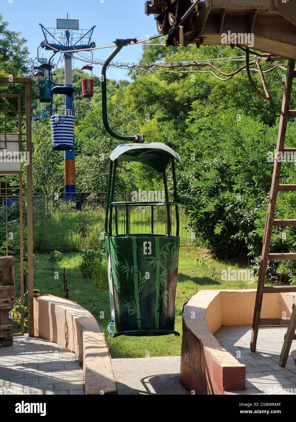 Colourful retro gondolas of the vintage Soviet cable car in Odesa / Odessa, Ukraine towards Otrada beach; near the terminal - Smartphone Captured Stock Image