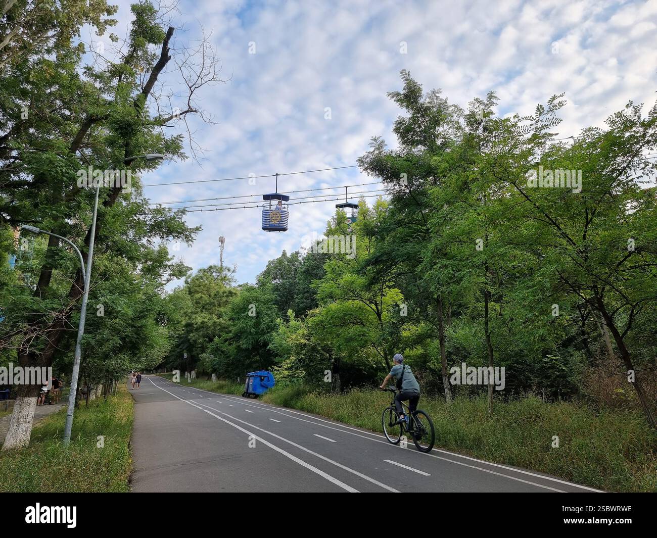Colourful gondolas of vintage Soviet cable car towards Otrada beach, flying over the ‘Path of Health’ between Lanzheron Beach & Arcadia Beach Odesa - Smartphone Captured Stock Image