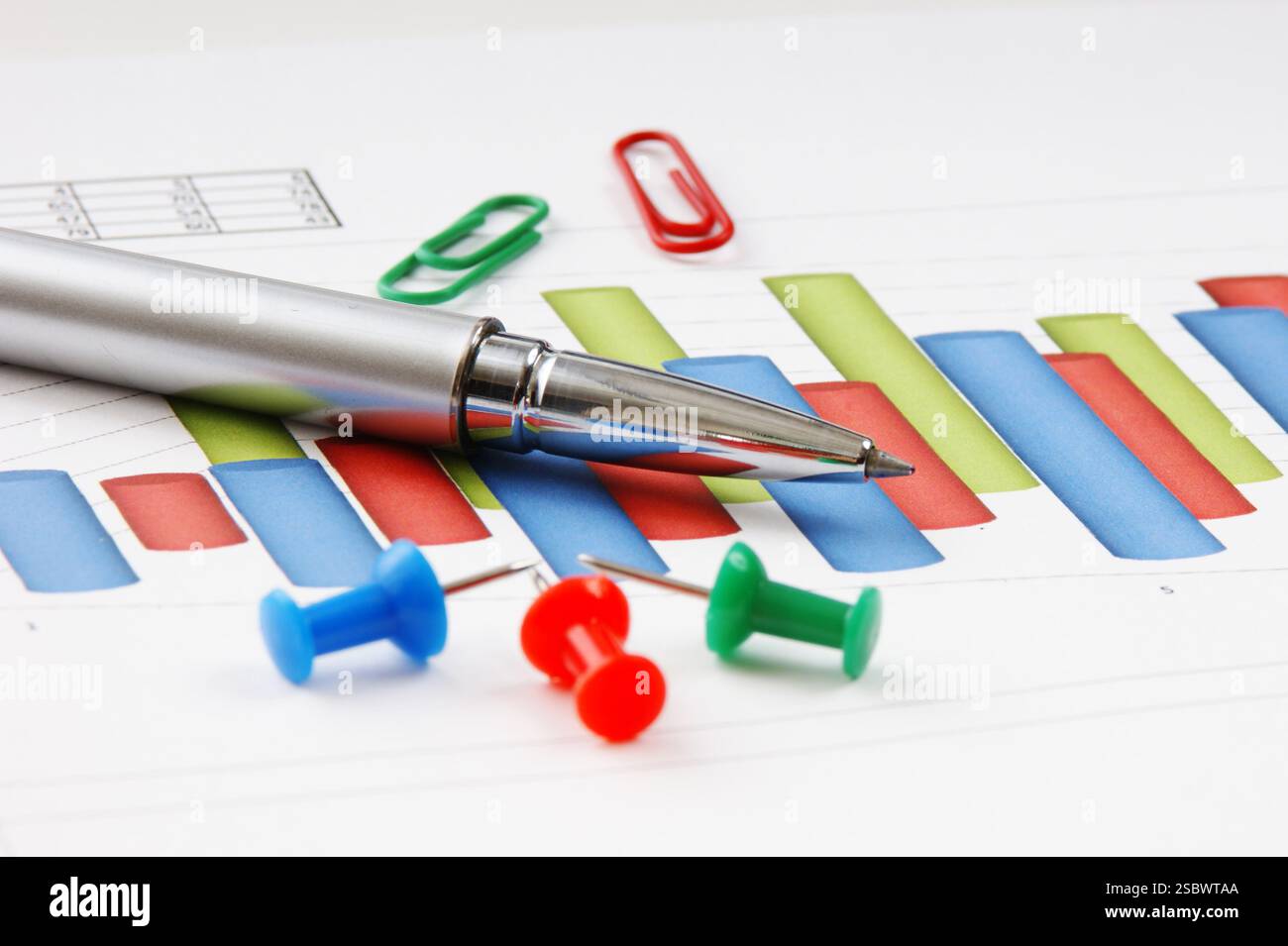 Graphs tables and documents laid on the table Stock Photo