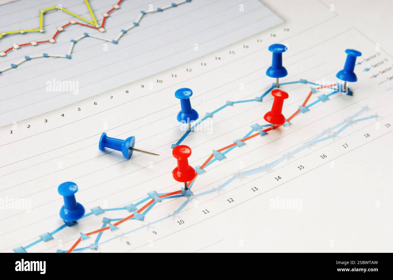 Graphs tables and documents laid on the table Stock Photo
