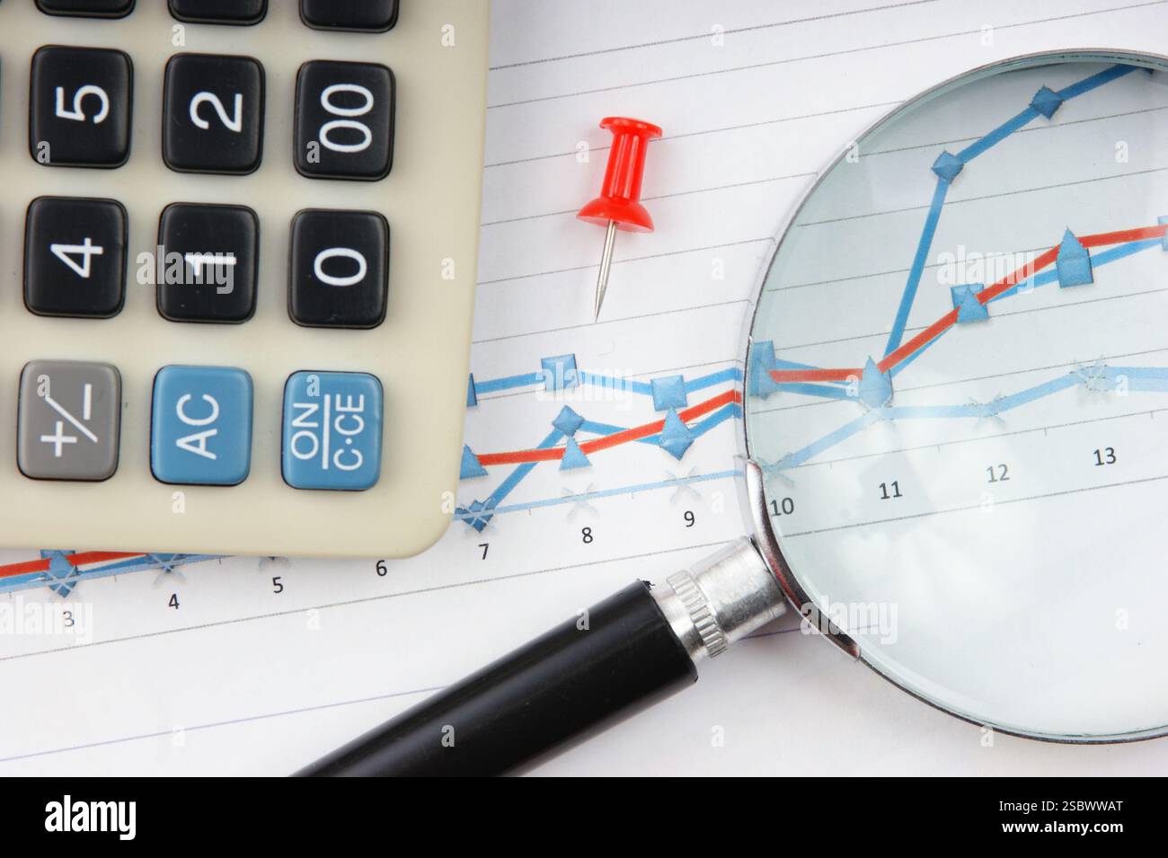 Graphs tables and documents laid on the table Stock Photo