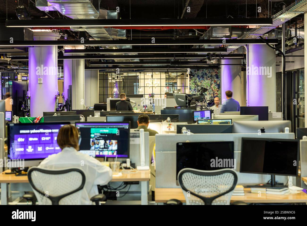 IMAGE DISTRIBUTED FOR YAHOO - Yahoo employees work at the company's New ...