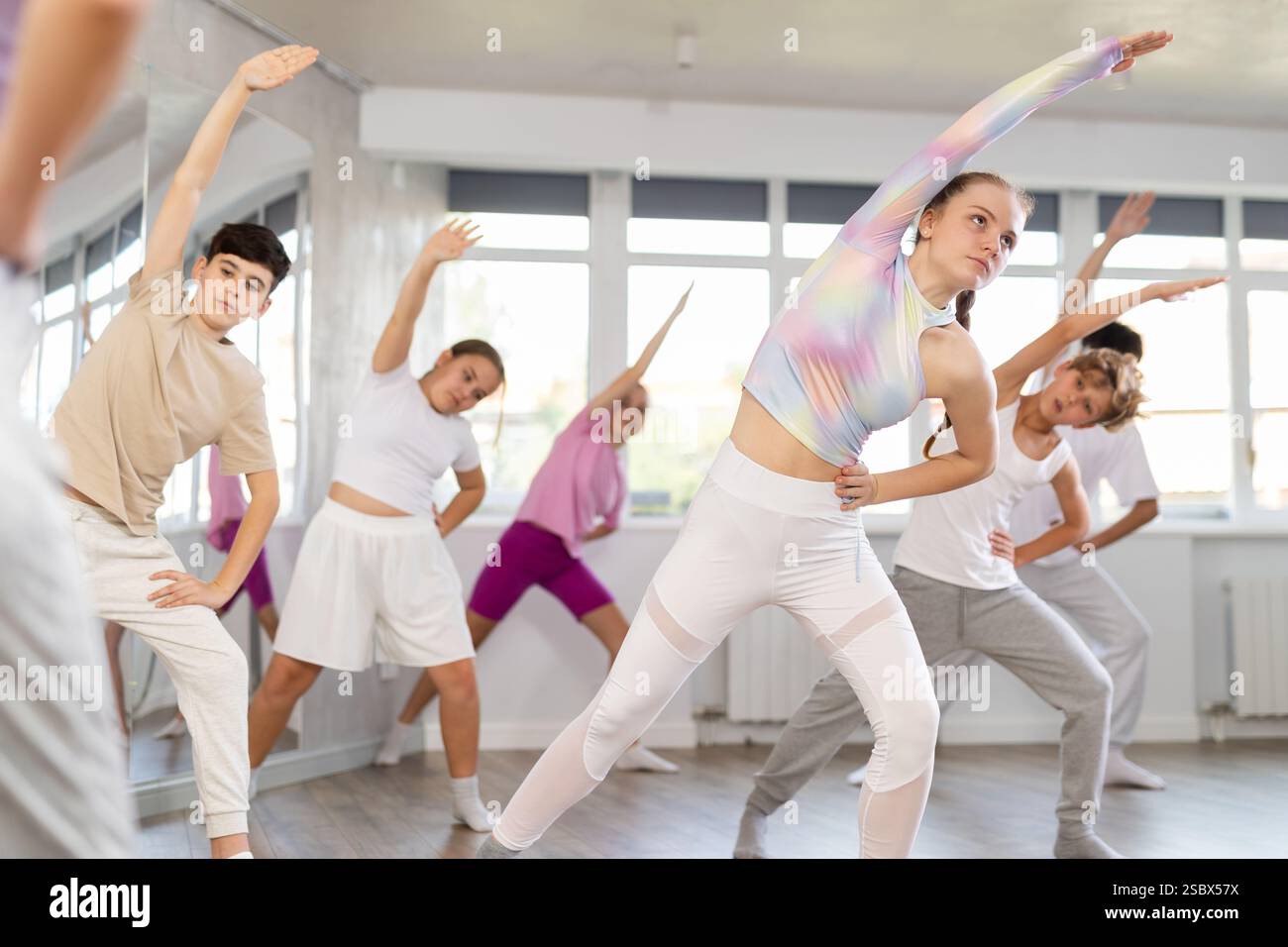 Group of children warming up before dance class Stock Photo