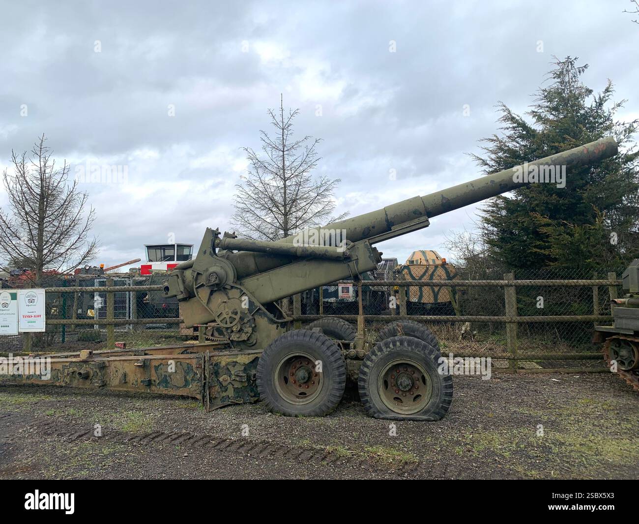 Tank Tanks Banbury Lane Northamptonshire army military war destroy painted green gun guns wars war battle track tracks outside metal armoured plate - Smartphone Captured Stock Image