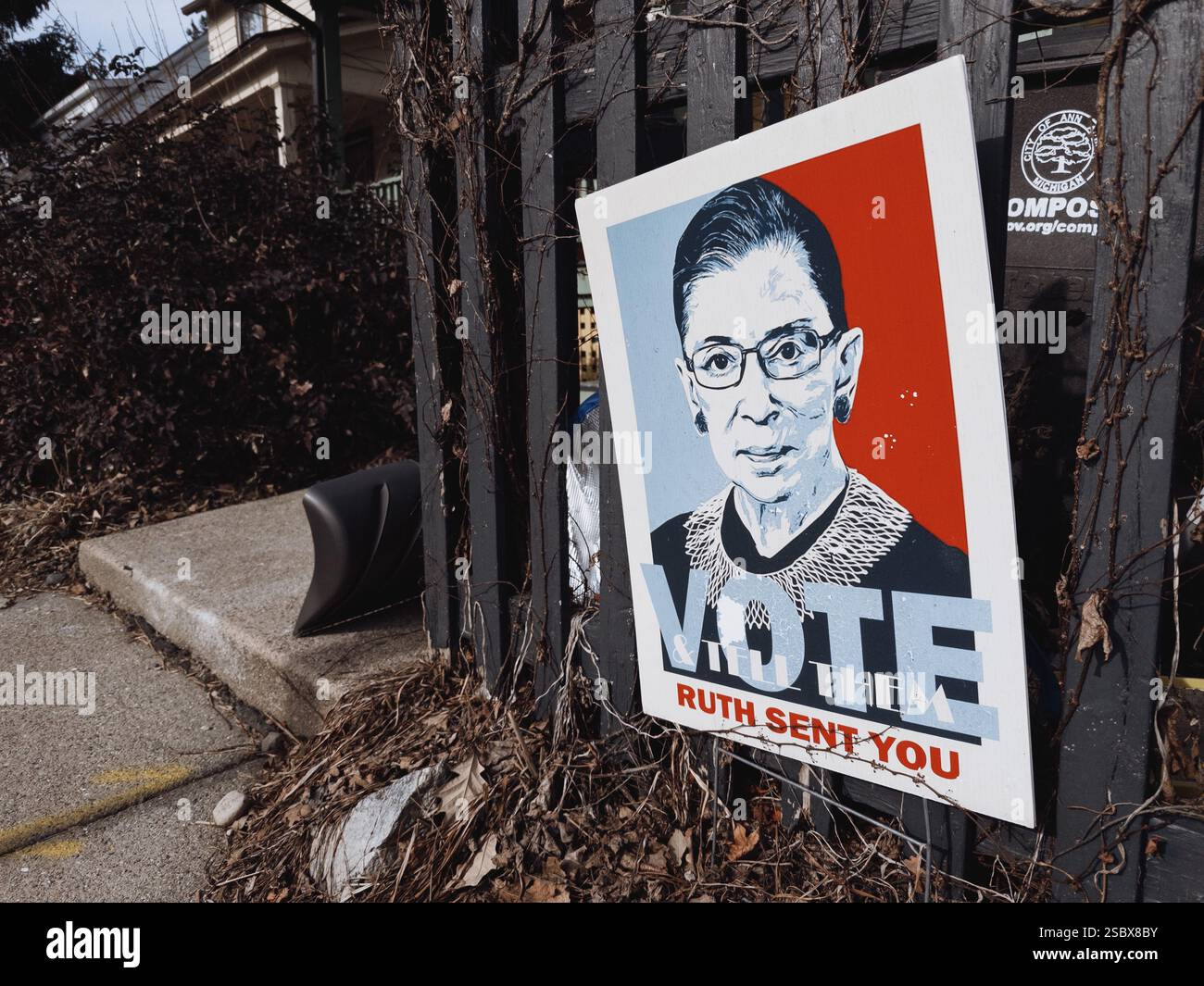 A sign depicting Ruth Bader Ginsburg with the message VOTE Ruth Sent You, in Ann Arbor Michigan USA - Smartphone Captured Stock Image