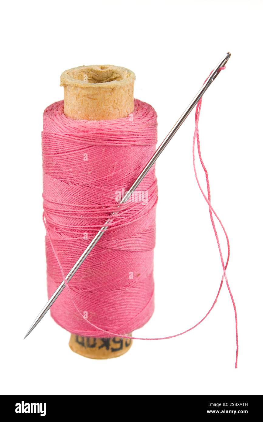 Sewing thread isolated on white background Stock Photo - Alamy