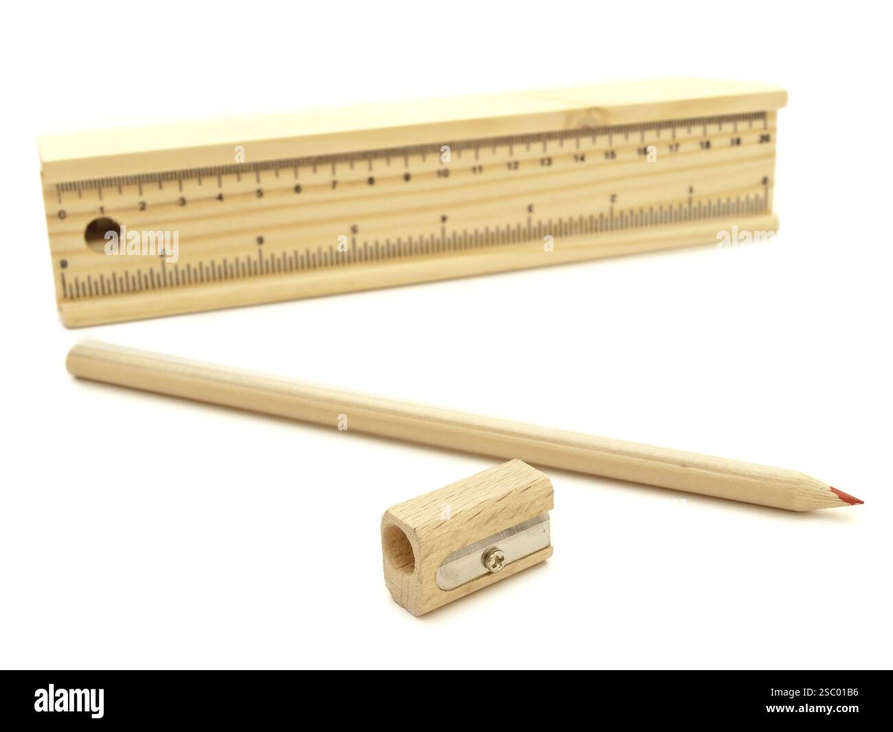Sharpined Ruler Wooden Pencil Sharpener And Pencil-Box With Ruler Against The White ...