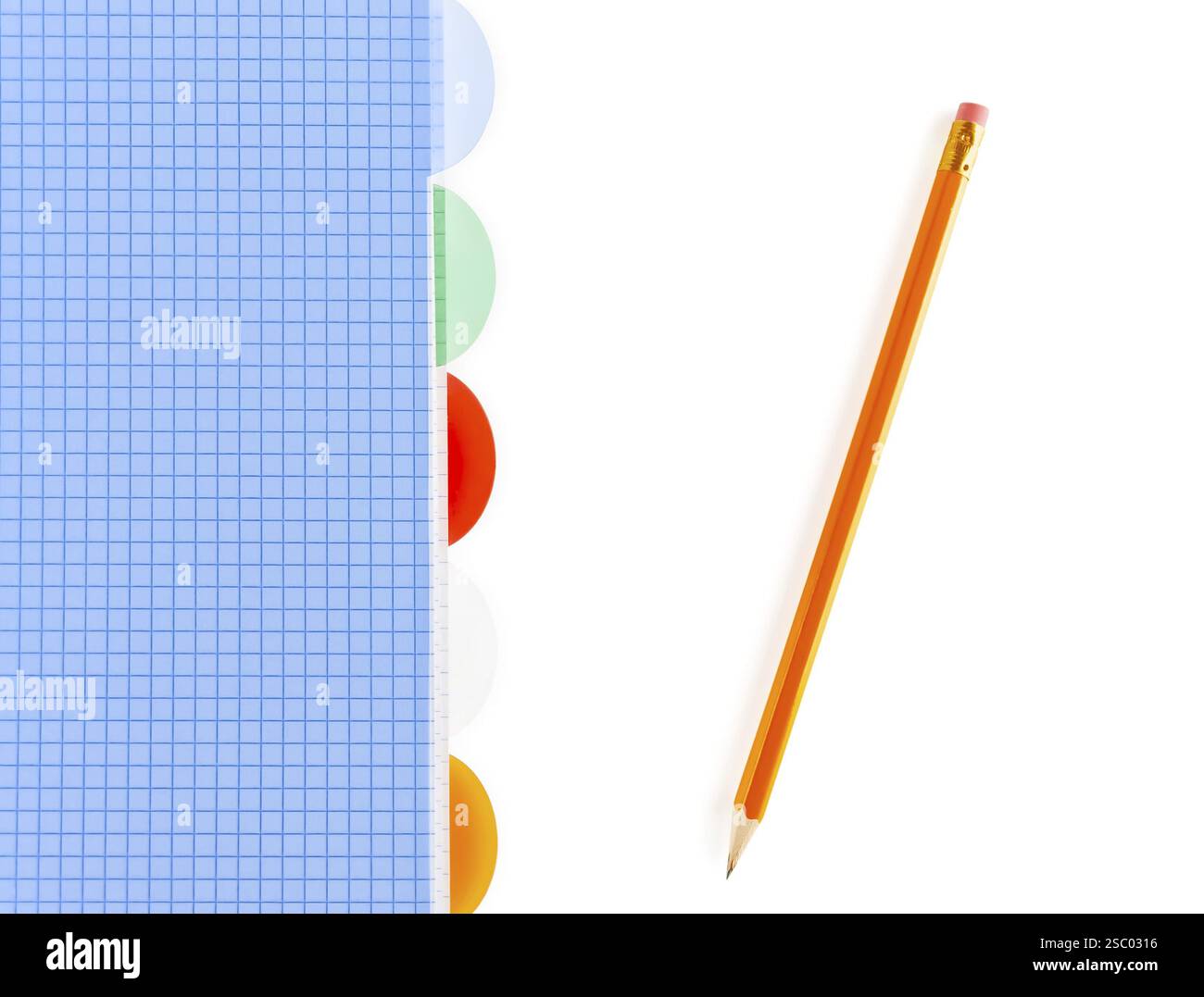 Checked notebook and pencil over white background Stock Photo