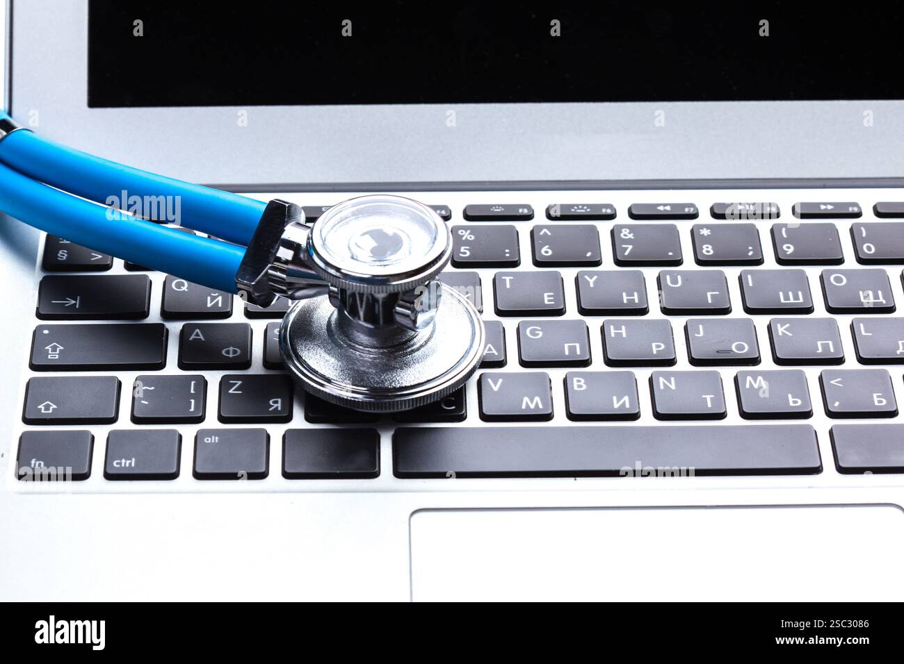 Medical stethoscope on computer keyboard Stock Photo - Alamy