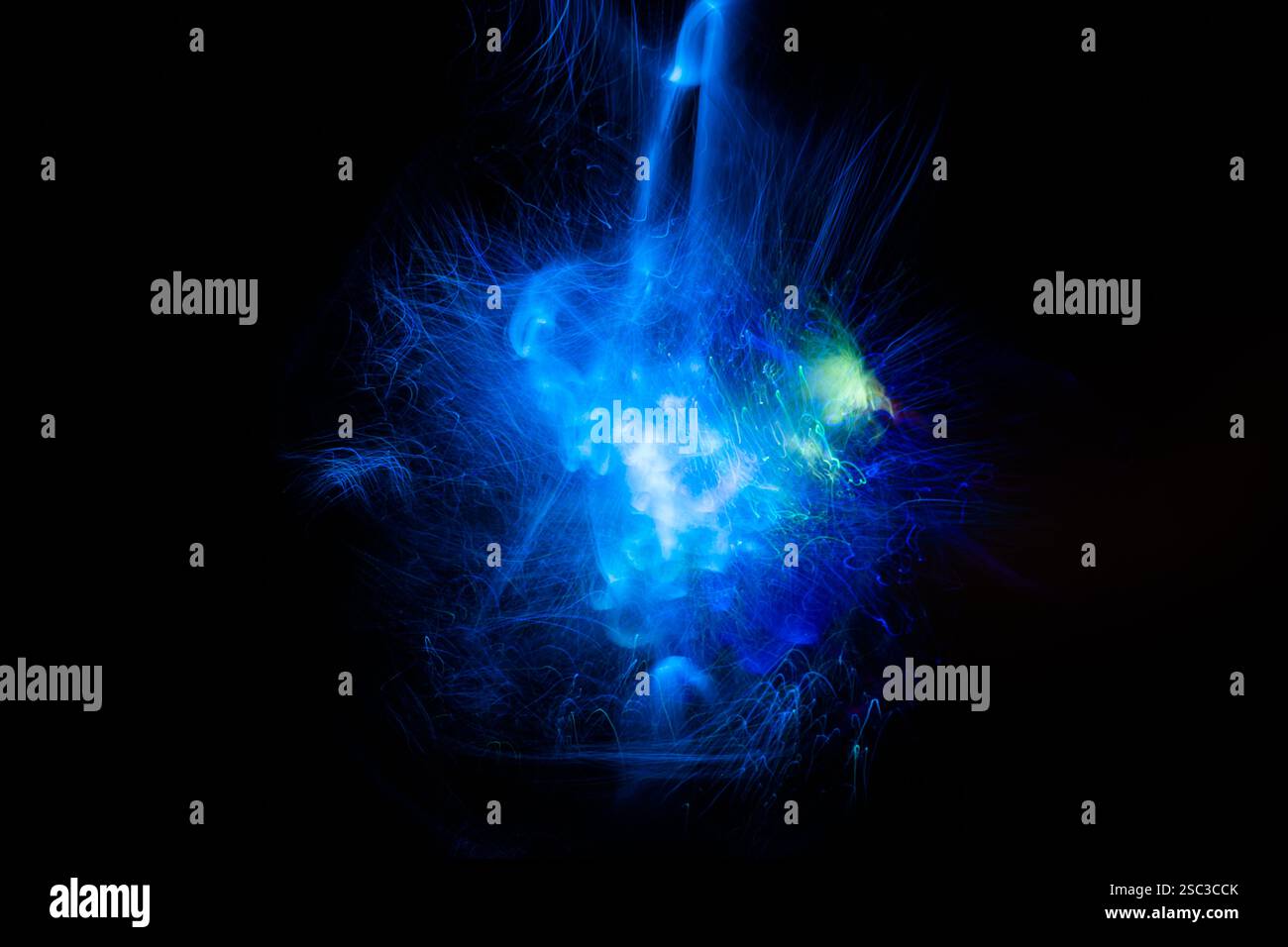 Blue Light energy explosion with elegant glowing lines. Abstract technology background. Stock Photo
