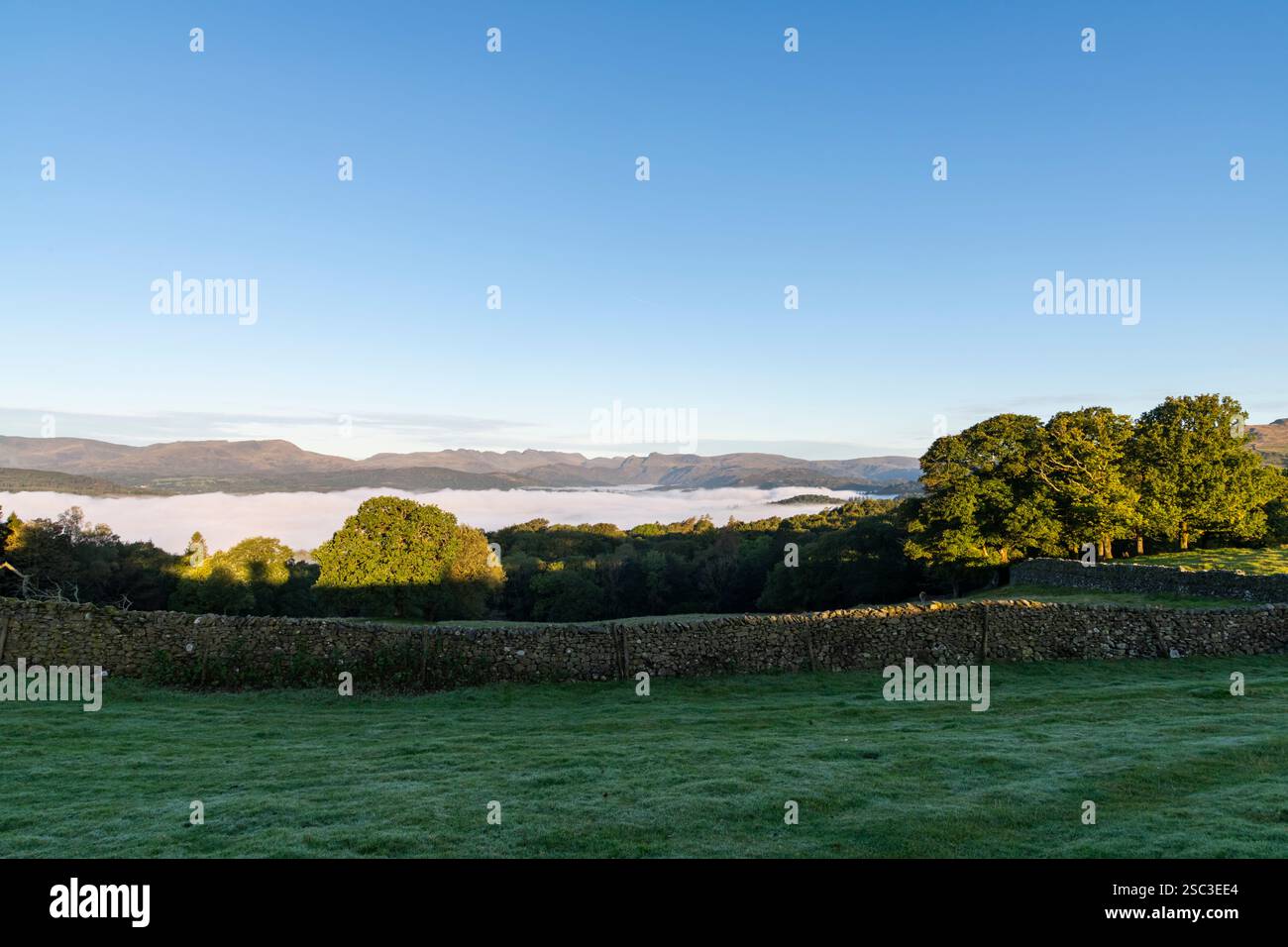 Cloud inversion over Lake Windermere on a beautiful autumn morning in ...